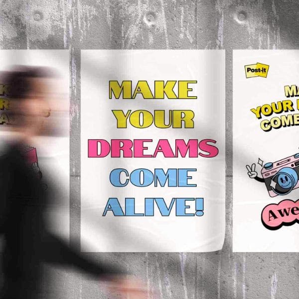 3M-AR-filter-PMG-4.jpg Man walks by a wall with 3M AR filters promotional posters that say Make your dreams come alive!